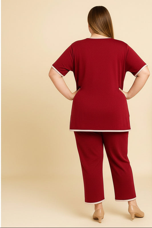 Woman wearing a red outfit on a beige background