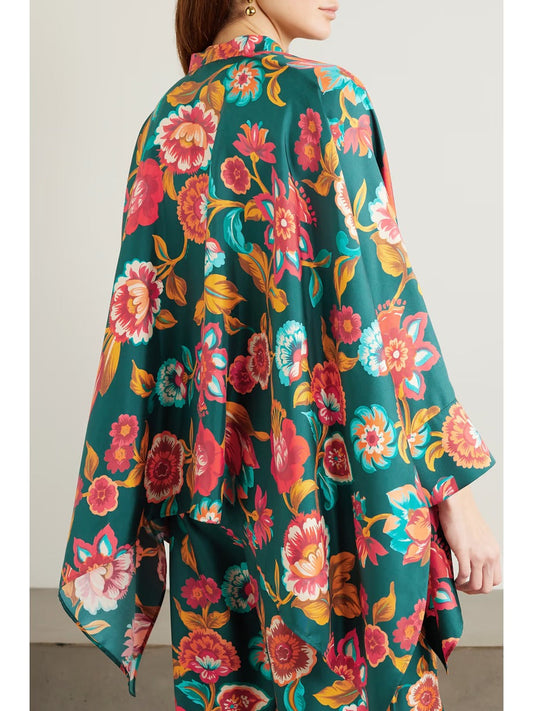 Colorful floral kimono-style garment on a plain background