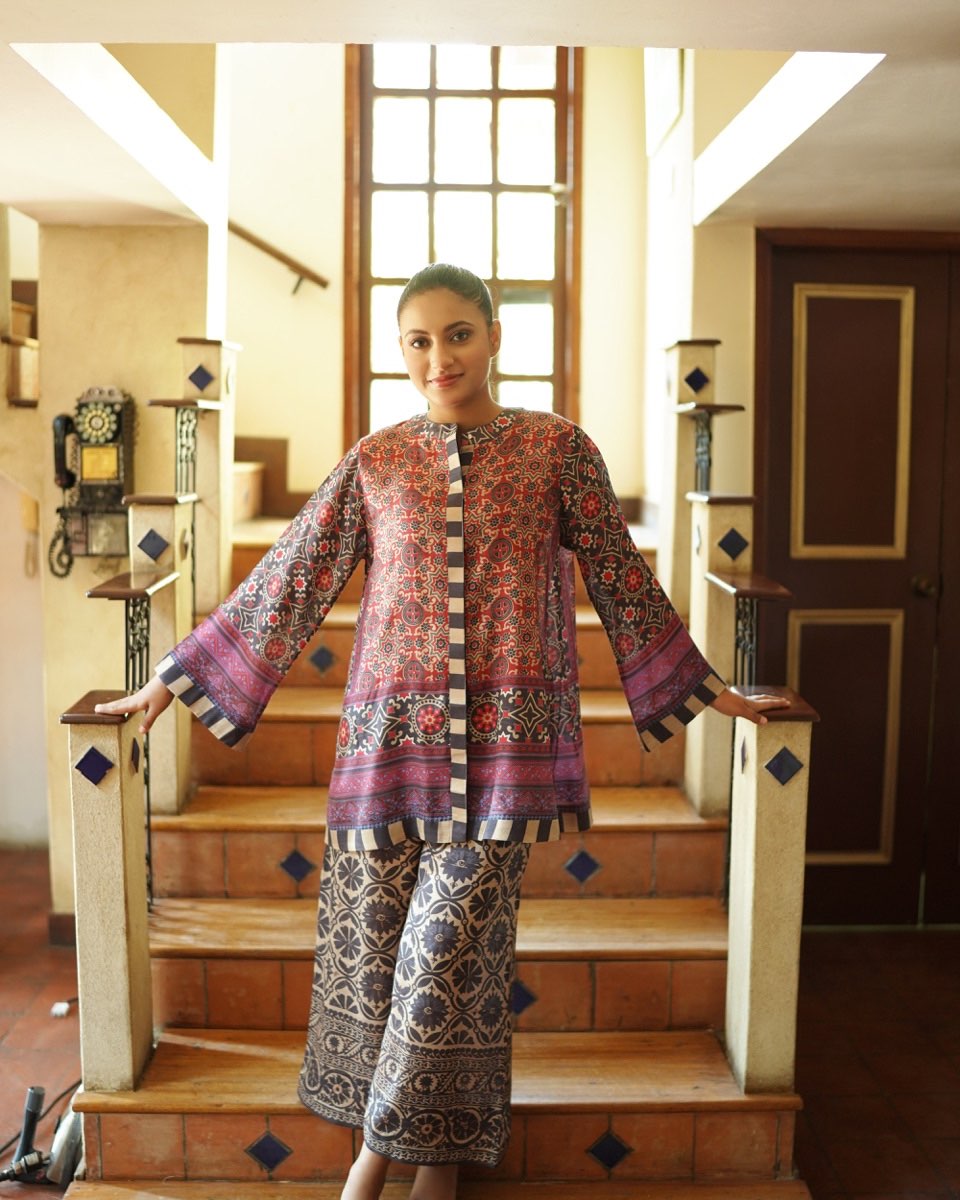 “Rust mosaic printed co-ord set for women – full front view on staircase”