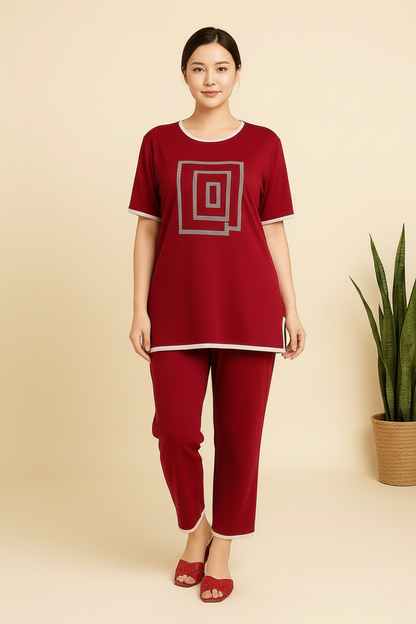 Woman wearing a red outfit with a geometric design on a beige background