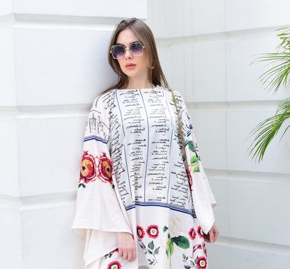 "Woman wearing a floral and script print cotton co-ord set – stylish and elegant outfit for women by PoshBella, perfect for casual and festive wear."