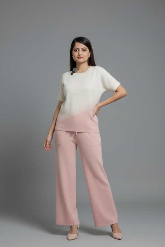 Woman wearing a white and pink outfit on a gray background