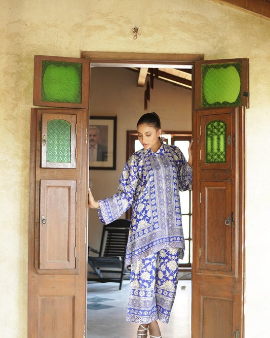 "Front view of PoshBella Calm Chaos Printed Co-ord Set NXG06 featuring statement blue floral print, mandarin collar top and straight-fit pants in Korean BSY fabric for elegant everyday style."