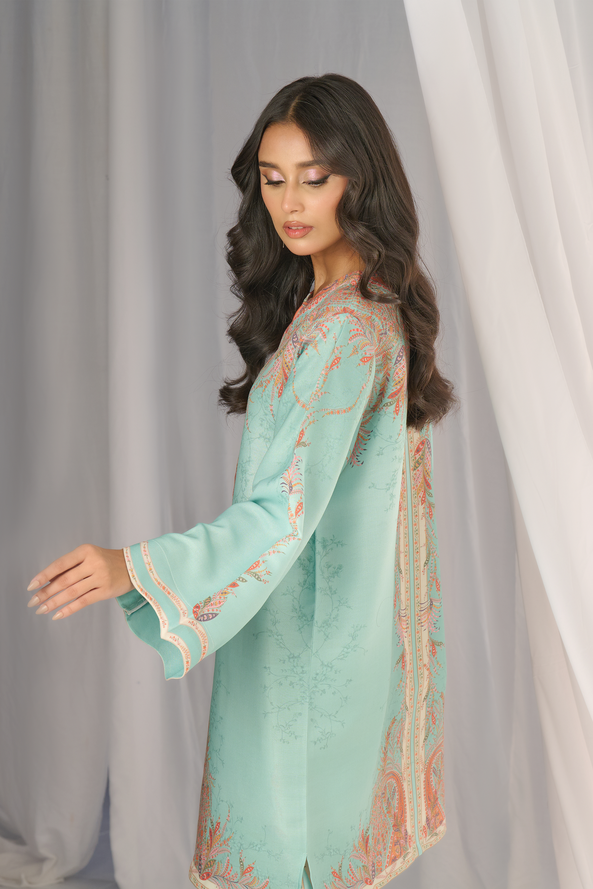 "Back view of PoshBella Minimal Printed Elegant Co-ord Set showcasing pastel aqua print, border motifs and flowy linan fabric ideal for wedding functions and elegant festive styling."