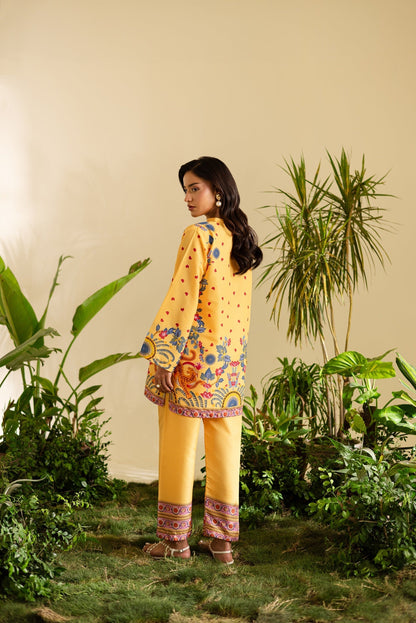 golden yellow co ord set for women, yellow printed co ord set, golden printed co ord set, linen co ord set for women, printed tunic and pants set, yellow floral co ord set, wide leg pants co ord set, ethnic inspired co ord set, statement printed co ord set, women summer co ord set, elegant co ord set for women, festive co ord set, workwear co ord set for women, brunch outfit for women, stylish printed two piece set, premium co ord set for women, PoshBella co ord set