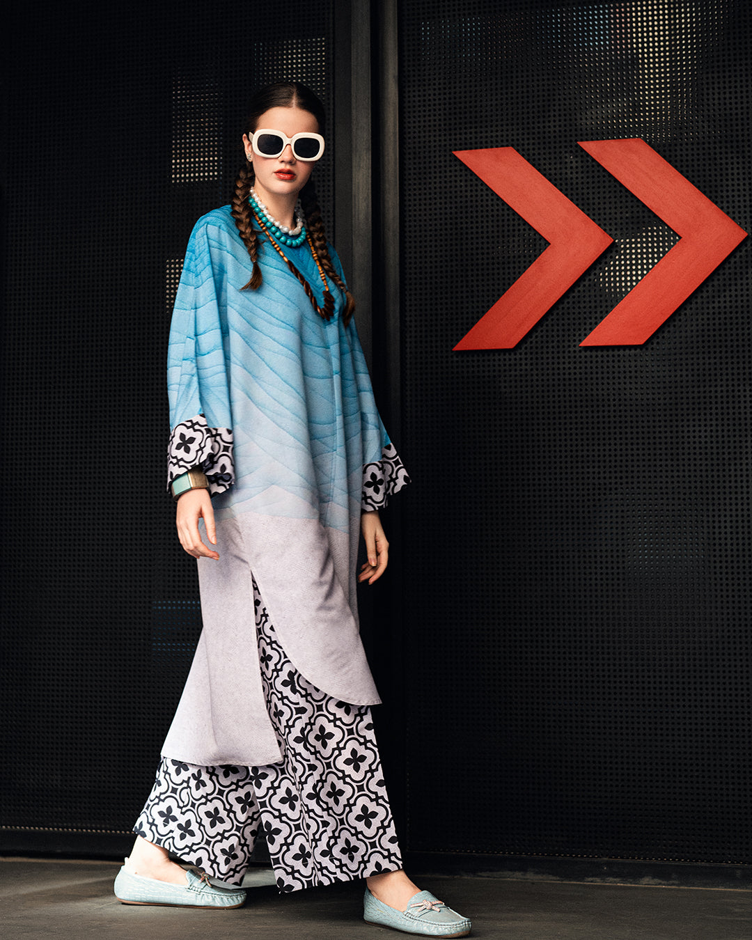 blue printed linen kurta set for women, designer festive kurta set with statement sleeves, blue and lavender printed kurta with floral wide leg pants, premium linen kurta set for festive wear, modern ethnic kurta set for women, stylish Rakhi and Diwali kurta set, designer printed kurta with wide leg pants, festive ethnic outfit for women, contemporary Indian kurta set, statement sleeve festive kurta set
