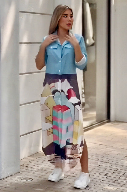 graphic print dress for women, long shirt dress for women, satin shirt dress, printed maxi shirt dress, sky blue shirt dress, multicolour graphic dress, button down dress for women, casual long dress, western dress for women, stylish dresses online India, travel dress for women, brunch outfit for women, trendy printed dress, PoshBella dresses