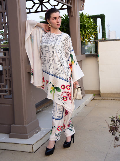 "Woman wearing a floral and script print cotton co-ord set – stylish and elegant outfit for women by PoshBella, perfect for casual and festive wear."