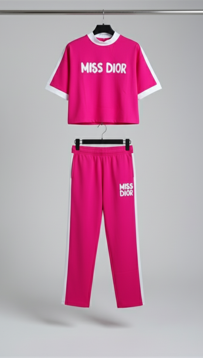 Stylish athleisure outfit for women – hot pink Miss Dior co-ord set with side stripe detail and relaxed fit.