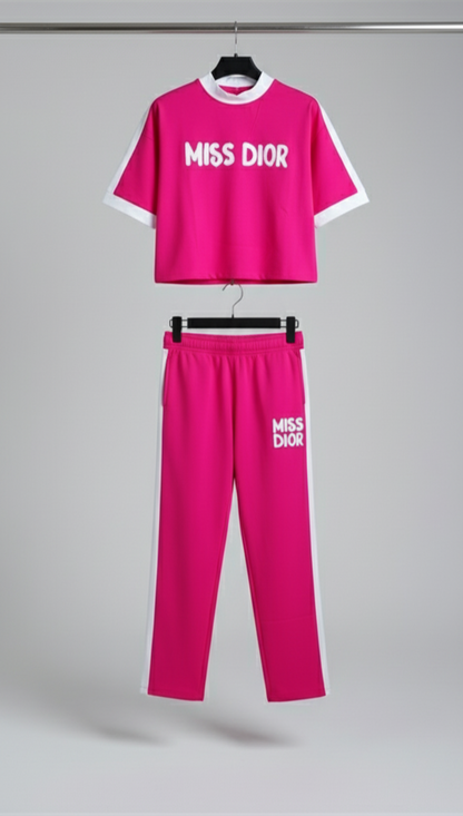 Stylish athleisure outfit for women – hot pink Miss Dior co-ord set with side stripe detail and relaxed fit.