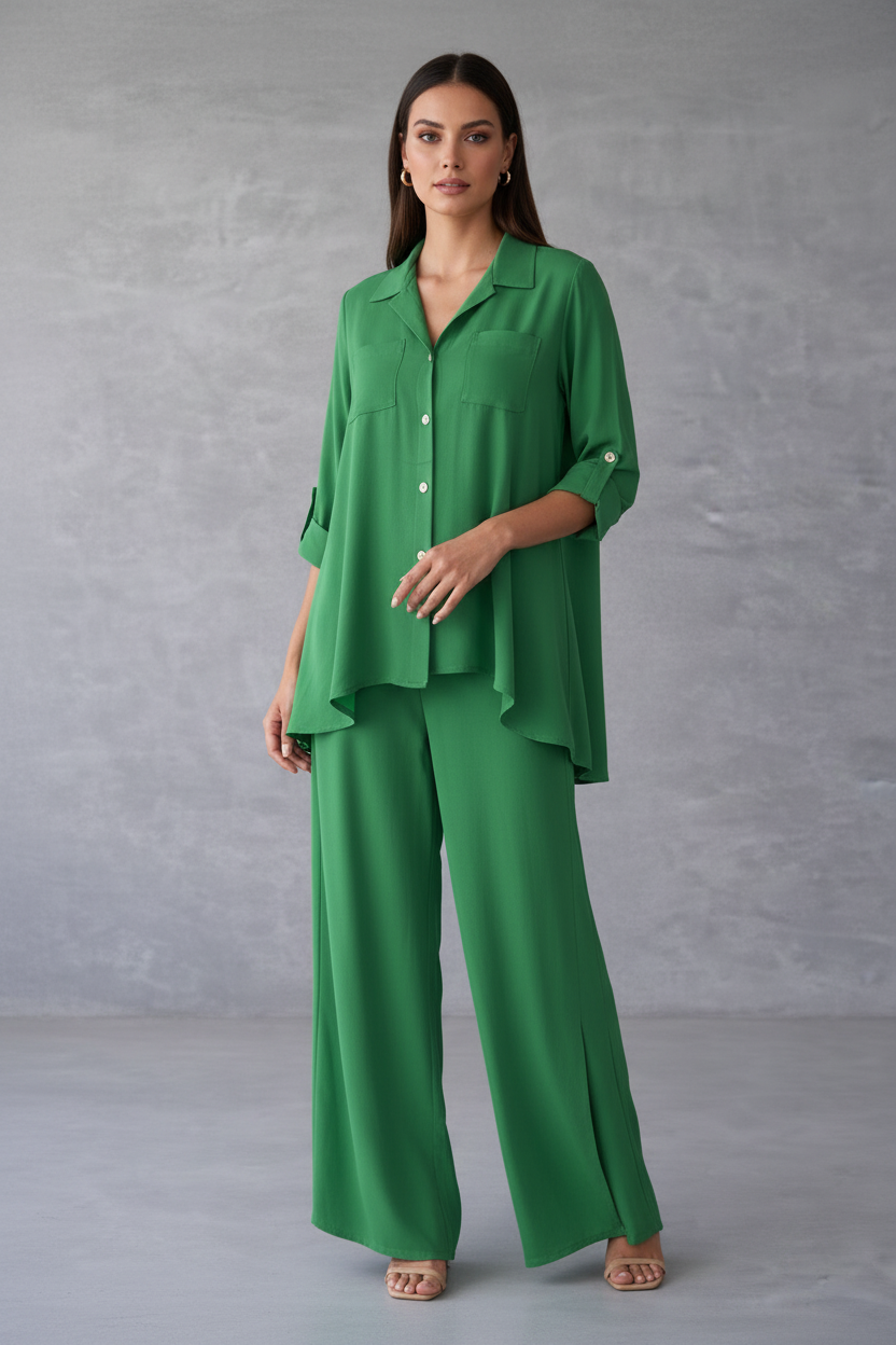 Woman wearing a green outfit against a gray background