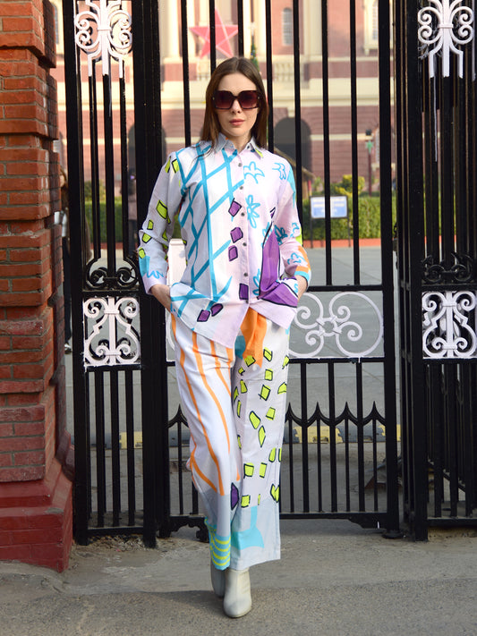 "Woman wearing a multicolour abstract print cotton co-ord set – stylish, breathable, and modern outfit for women by PoshBella."